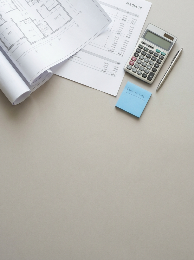A gross margin calculator on a desk